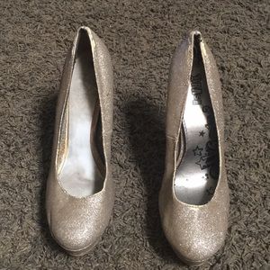 Sparkly gold high heels